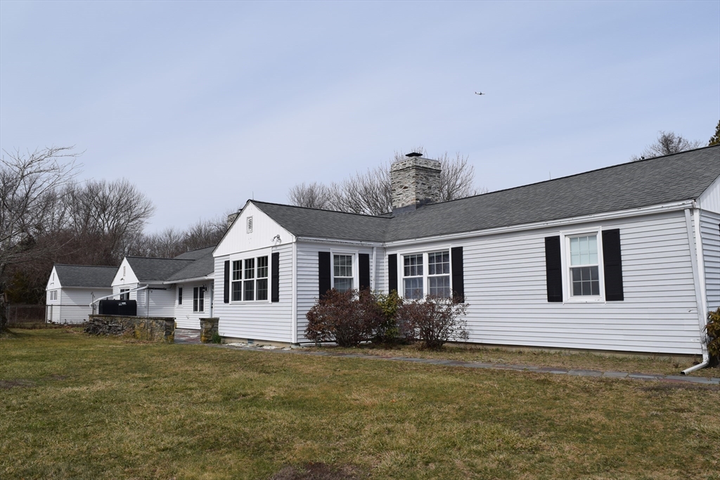 475 Cedar Avenue Swansea, MA 02777 - Photo 2 of 42 a view of a house with a garden