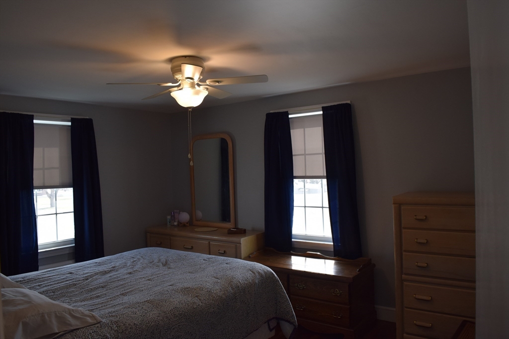475 Cedar Avenue Swansea, MA 02777 - Photo 21 of 42 a bedroom with a bed and window