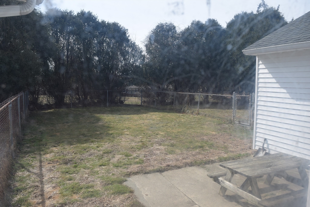 475 Cedar Avenue Swansea, MA 02777 - Photo 31 of 42 a view of a backyard