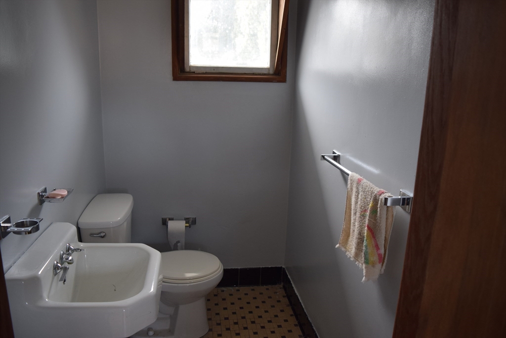 475 Cedar Avenue Swansea, MA 02777 - Photo 37 of 42 a bathroom with a sink and a toilet