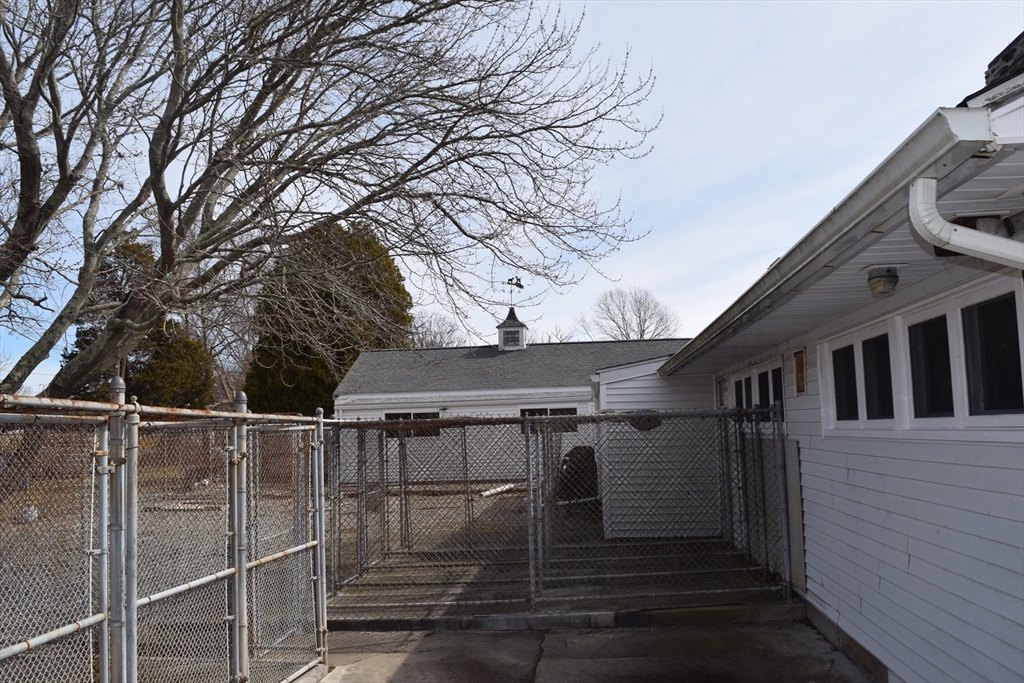 475 Cedar Avenue Swansea, MA 02777 - Photo 40 of 42 a view of a house with a wooden deck