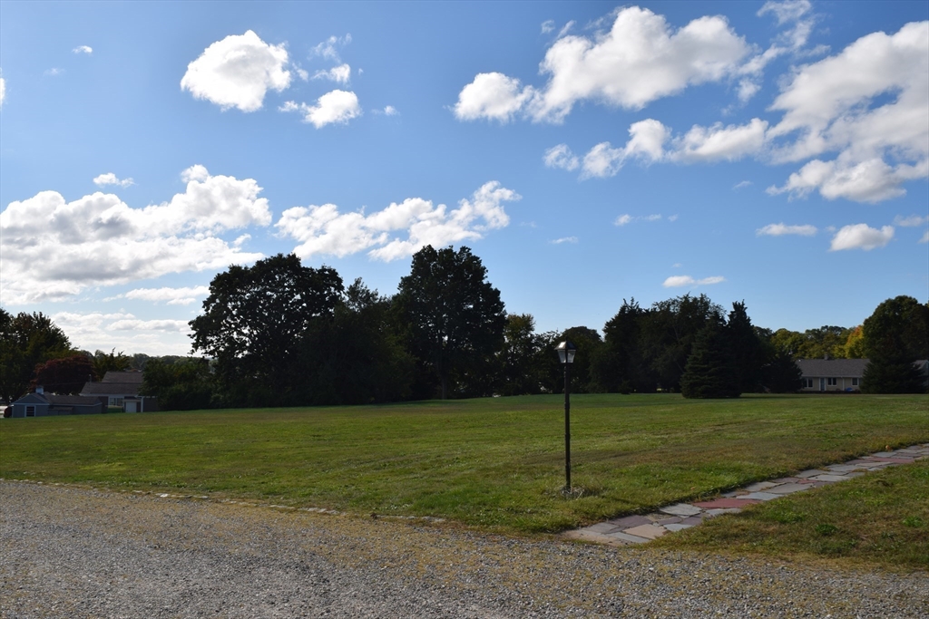 475 Cedar Avenue Swansea, MA 02777 - Photo 5 of 42 a yard with lots of green space