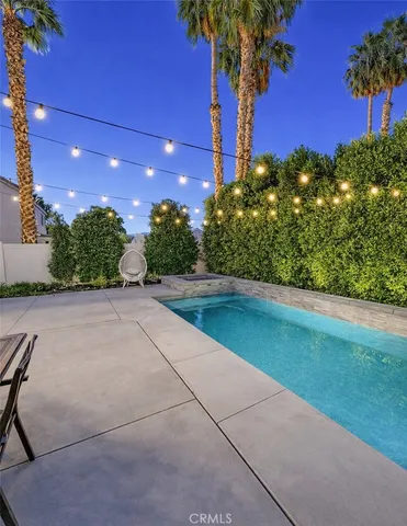 a wooden bench sitting in front of a building