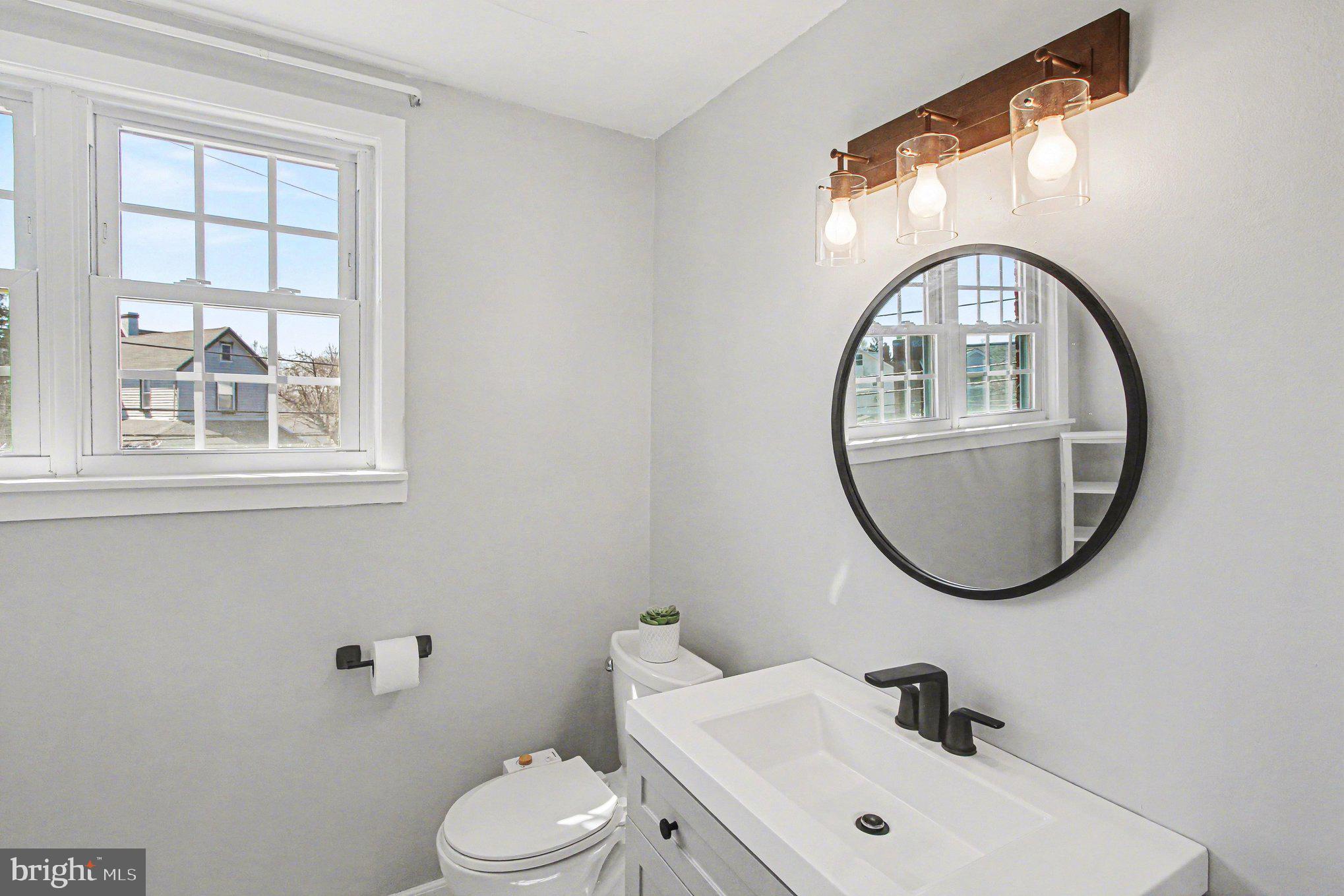 822 Hancock Street Ridley Park, PA 19033 - Photo 20 of 30 a bathroom with a sink and a mirror