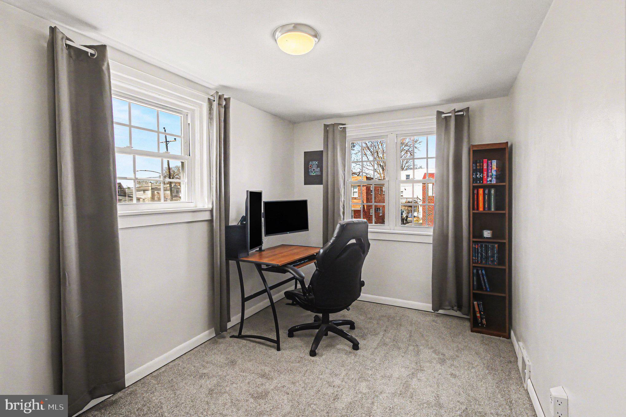 822 Hancock Street Ridley Park, PA 19033 - Photo 22 of 30 a view of a workspace with furniture and a window