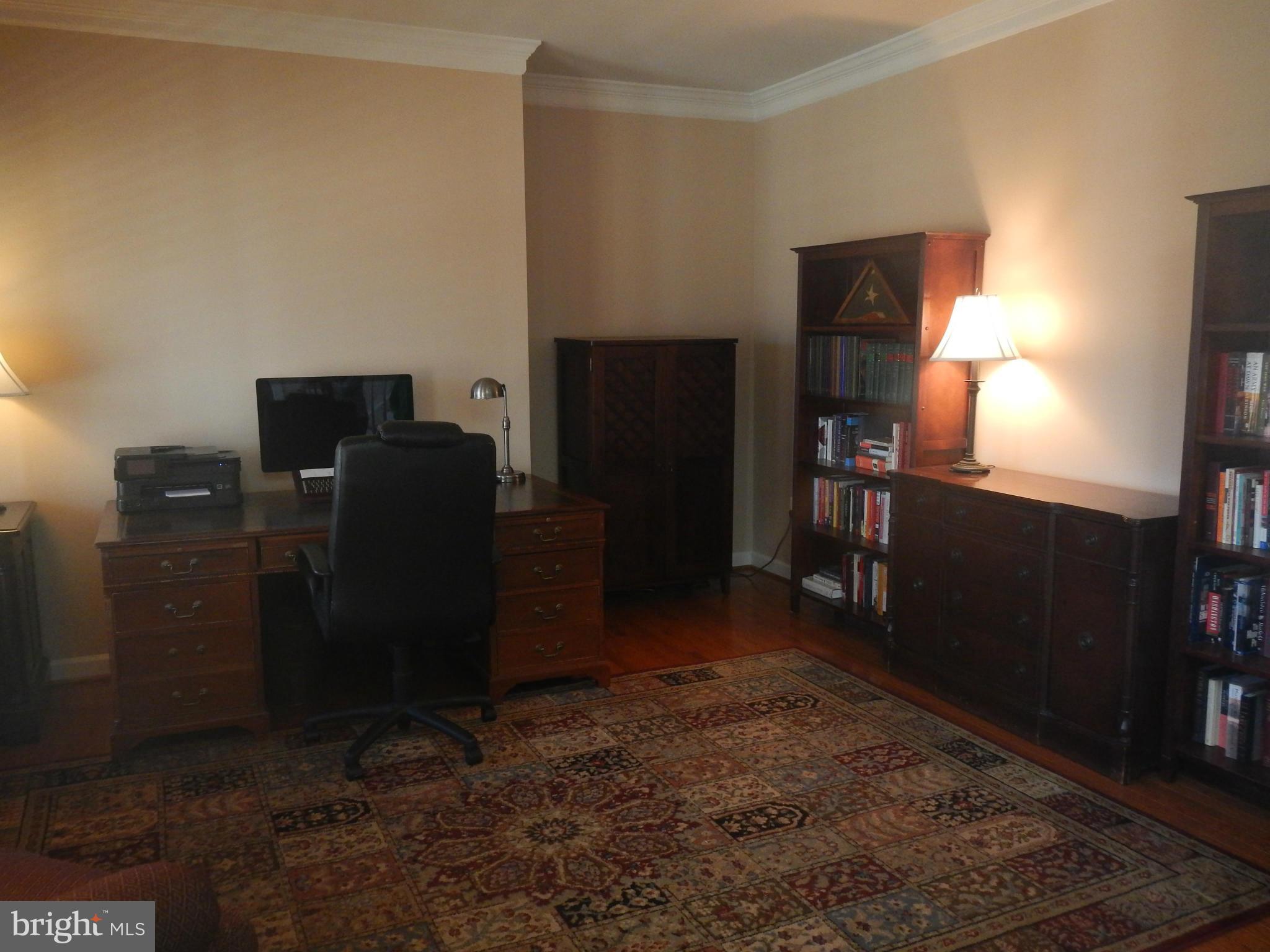 13602 Union Church Road Sumerduck, VA 22742 - Photo 11 of 30 a room with cabinets and flat screen tv