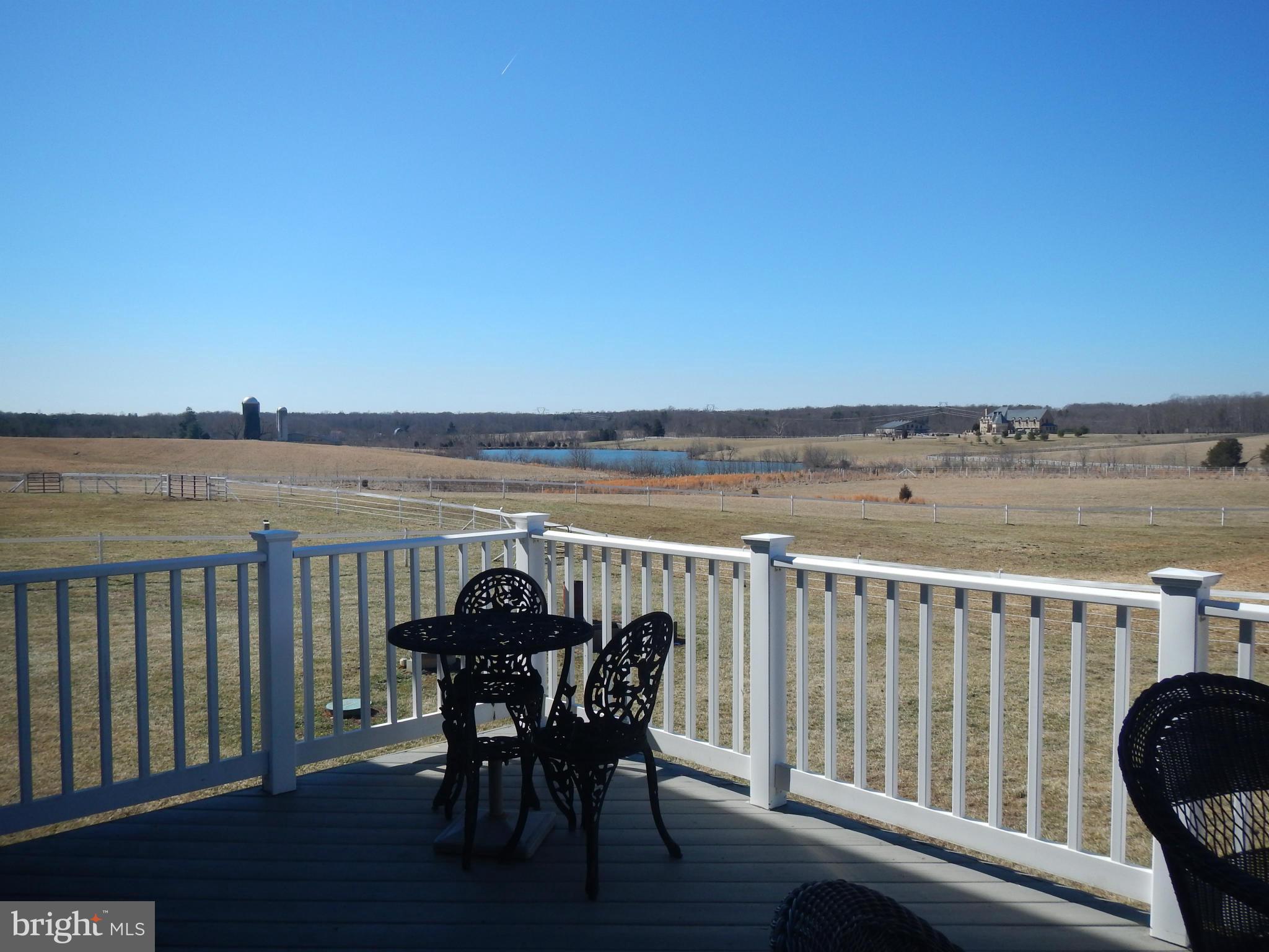 13602 Union Church Road Sumerduck, VA 22742 - Photo 14 of 30 a view of a chairs and table in the balcony