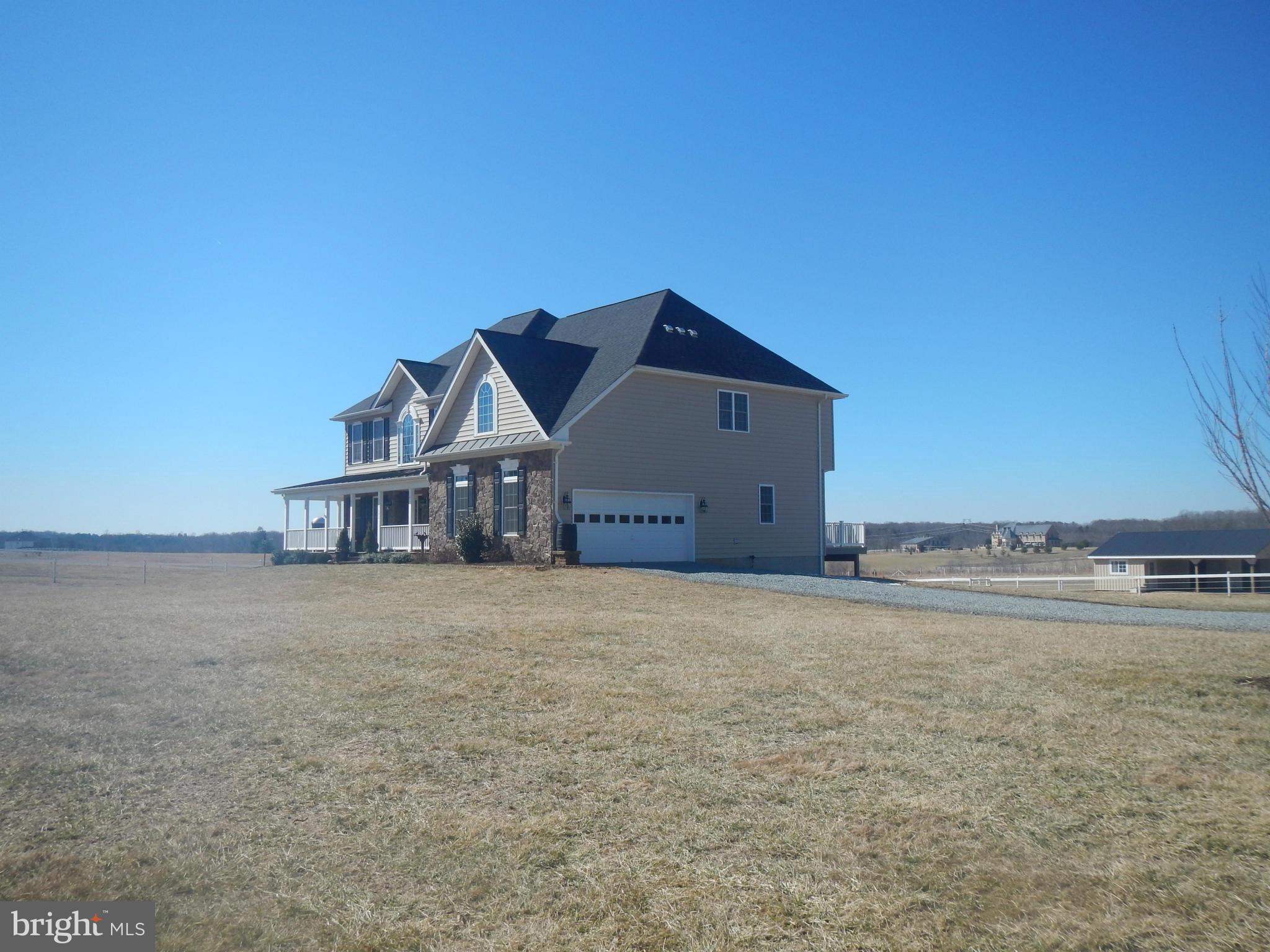 13602 Union Church Road Sumerduck, VA 22742 - Photo 2 of 30 a house with a field