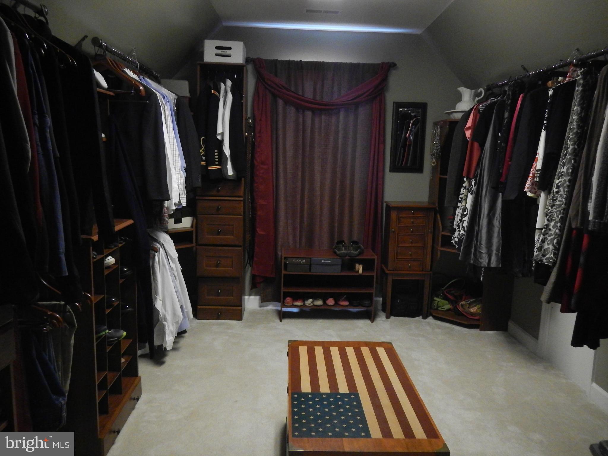13602 Union Church Road Sumerduck, VA 22742 - Photo 21 of 30 a view of walk in closet with clothes and shoes