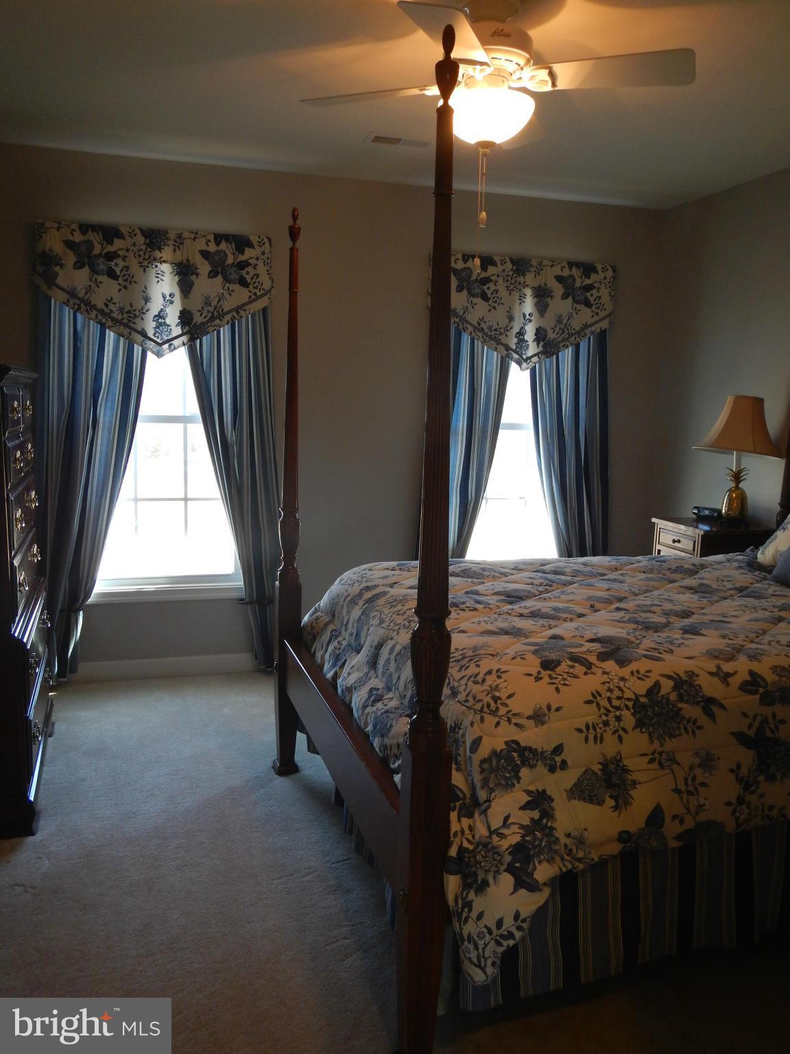 13602 Union Church Road Sumerduck, VA 22742 - Photo 23 of 30 a bed sitting in a bedroom next to a window