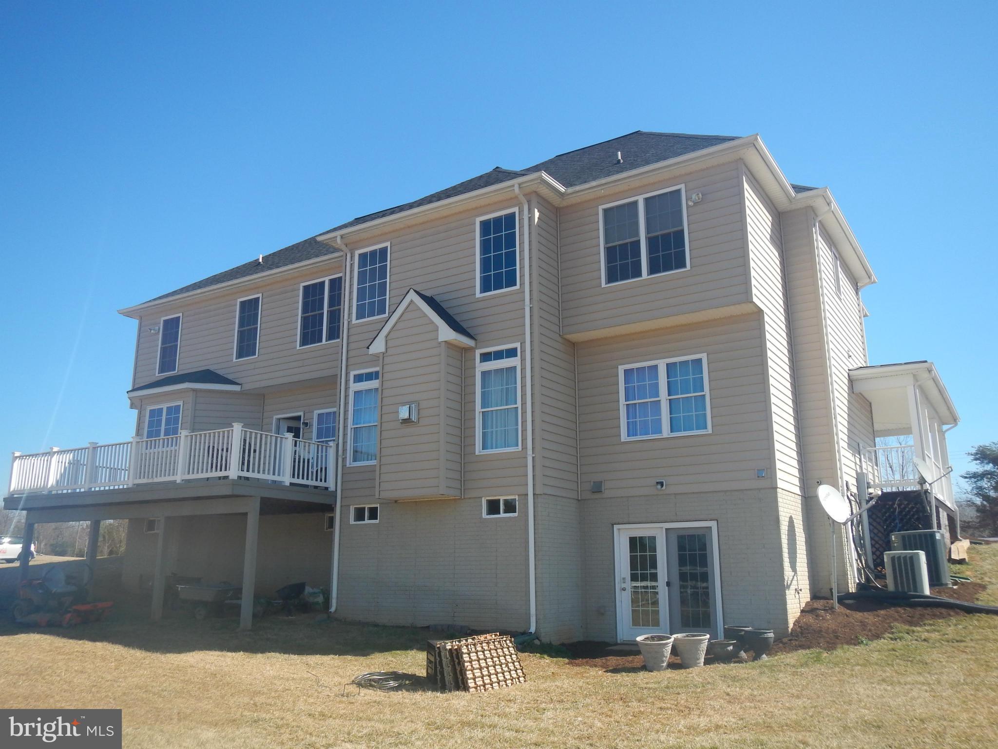 13602 Union Church Road Sumerduck, VA 22742 - Photo 3 of 30 a front view of a house with a yard