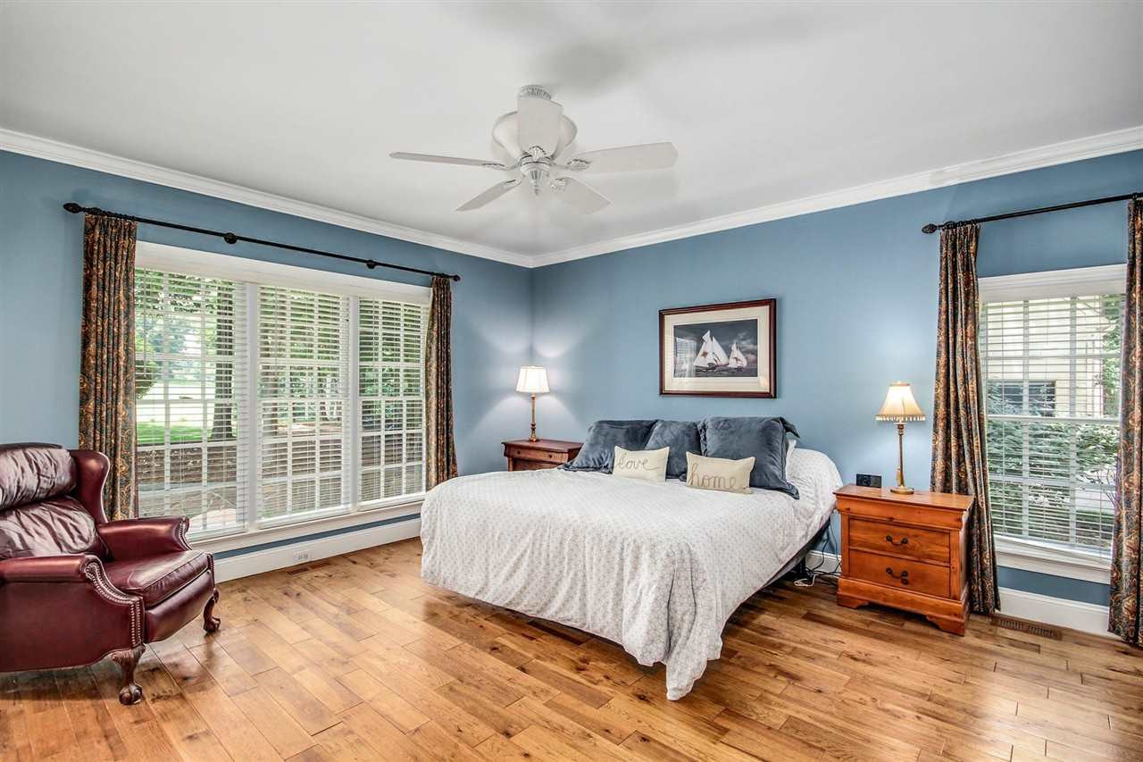 4812 Salem Ridge Road Holly Springs, NC 27540 - Photo 17 of 30 Fireplace! Hickory floors! Gorgeous views! Paradise awaits! 1st Floor Master Bedroom