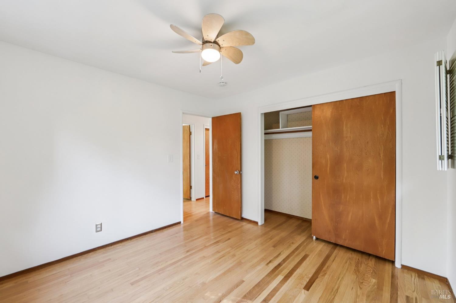 1050 Sunset Road Napa, CA 94558 - Photo 19 of 67 a view of an empty room with wooden floor