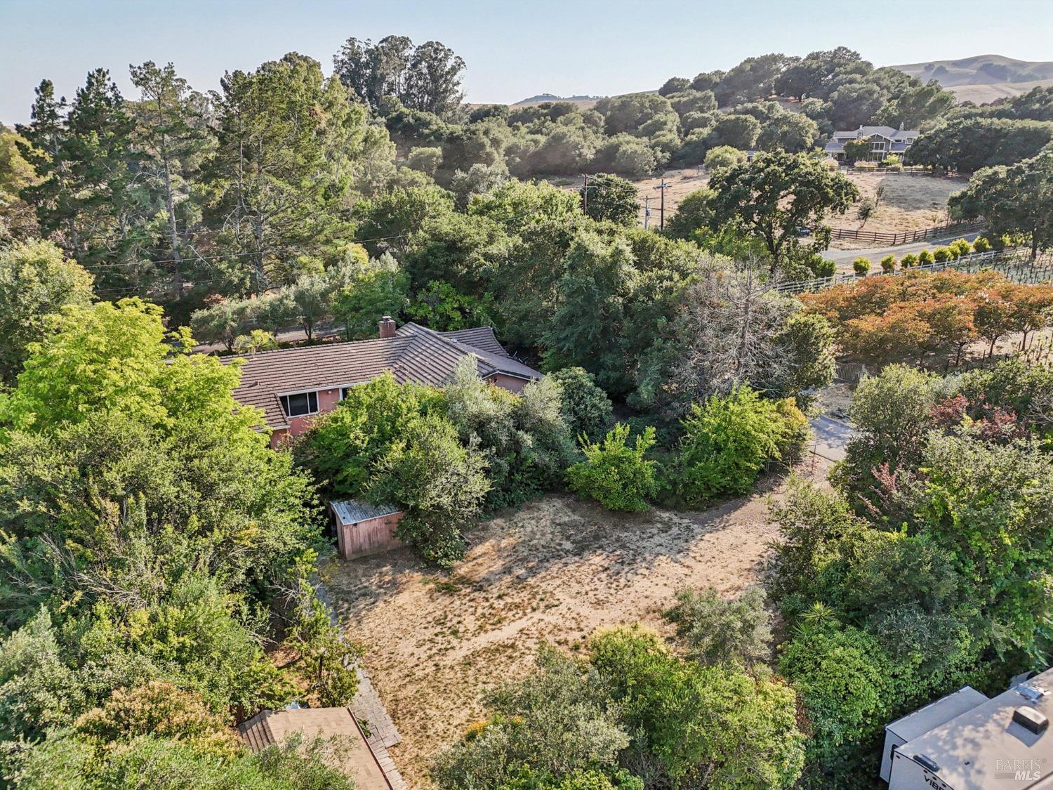 1050 Sunset Road Napa, CA 94558 - Photo 62 of 67 an aerial view of a house with a yard