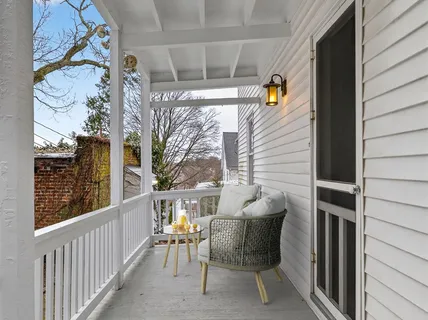 a view of a yard covered in snow