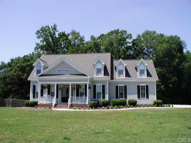 1612 Kendall Hill Road Willow Spring, NC 27592 - Photo 1 of 1 Elegant home with side load garage sits on almost an acre that is a true slice of paradise! Exterior Front