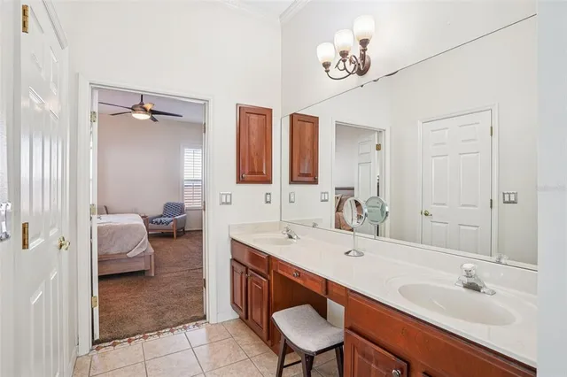 a spacious bathroom with a sink double vanity and a mirror