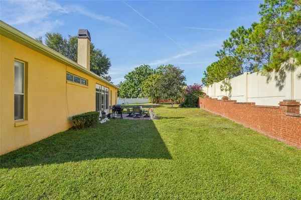 a view of a back yard of the house