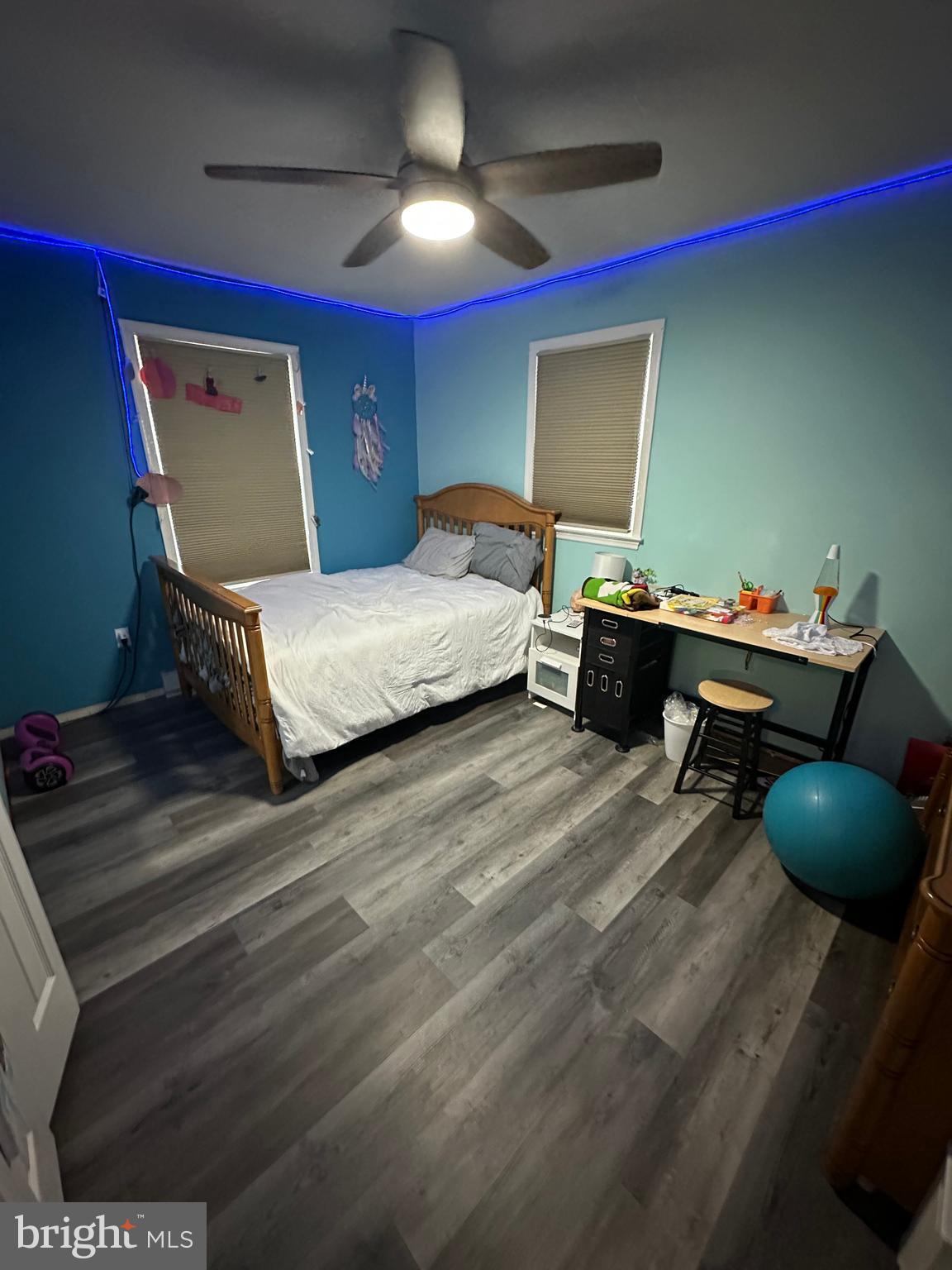 30 Williams Way Downingtown, PA 19335 - Photo 28 of 31 a bedroom with a bed and a chandelier