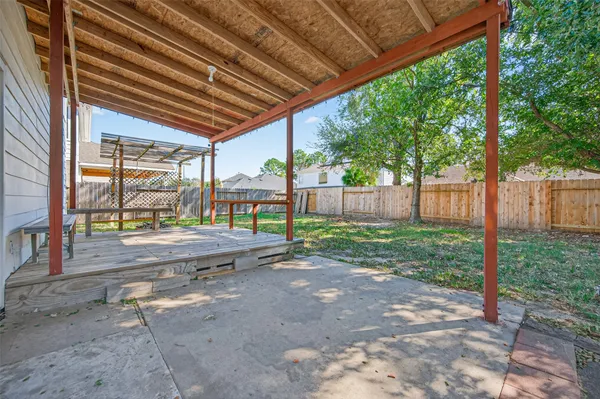 a view of backyard with green space