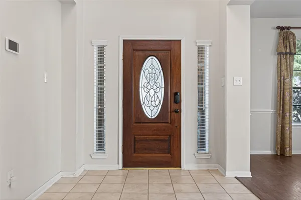 a view of entryway with washer and dryer