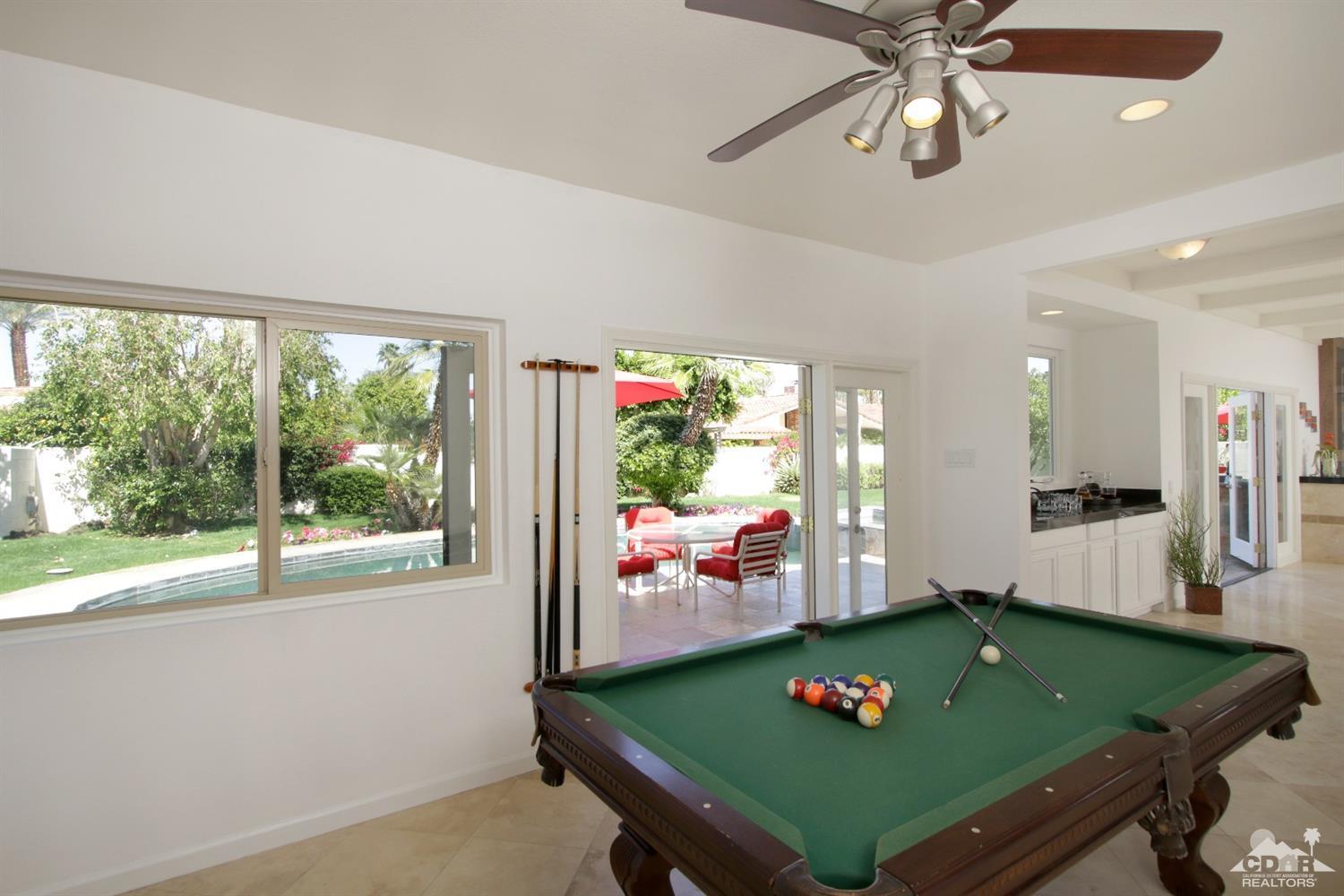 75570 Fairway Drive Indian Wells, CA 92210 - Photo 15 of 38 a room with furniture and a large window