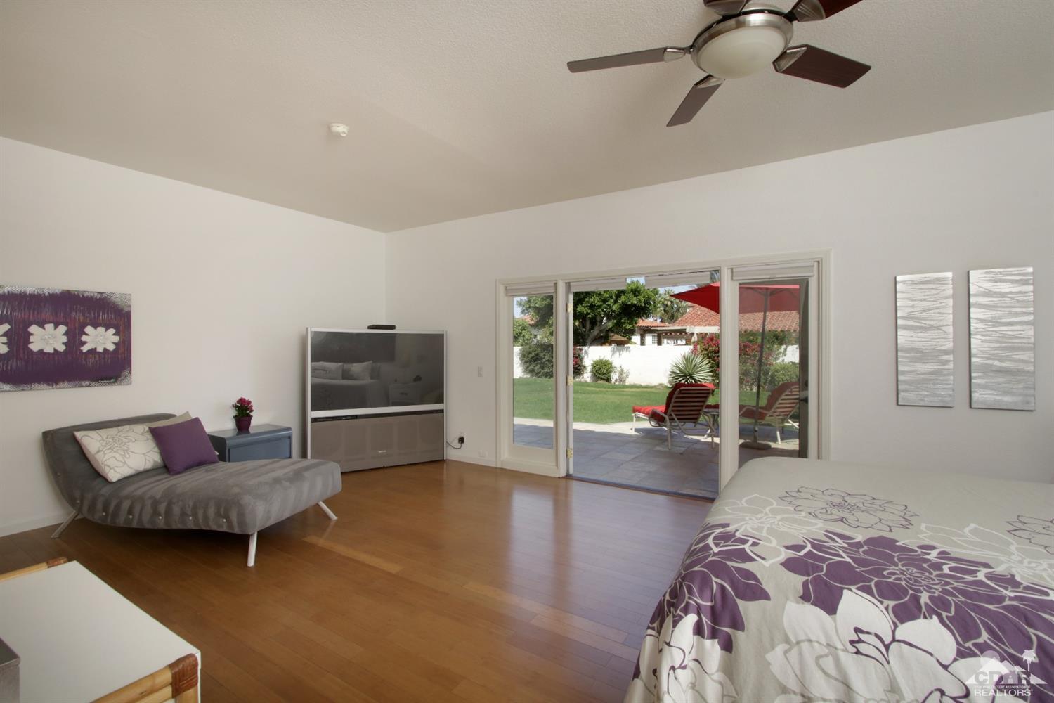 75570 Fairway Drive Indian Wells, CA 92210 - Photo 17 of 38 a living room with furniture and a flat screen tv