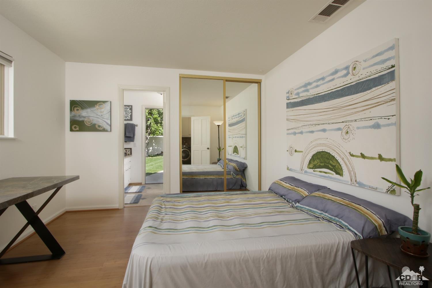 75570 Fairway Drive Indian Wells, CA 92210 - Photo 24 of 38 a bedroom with bed and a window