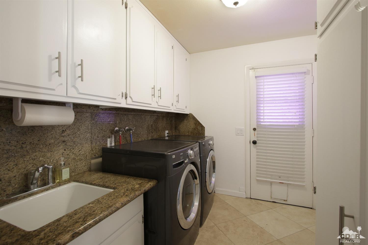 75570 Fairway Drive Indian Wells, CA 92210 - Photo 26 of 38 a utility room with sink dryer and washer