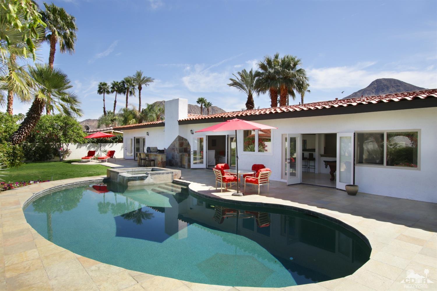 75570 Fairway Drive Indian Wells, CA 92210 - Photo 28 of 38 a view of a house with swimming pool and sitting area