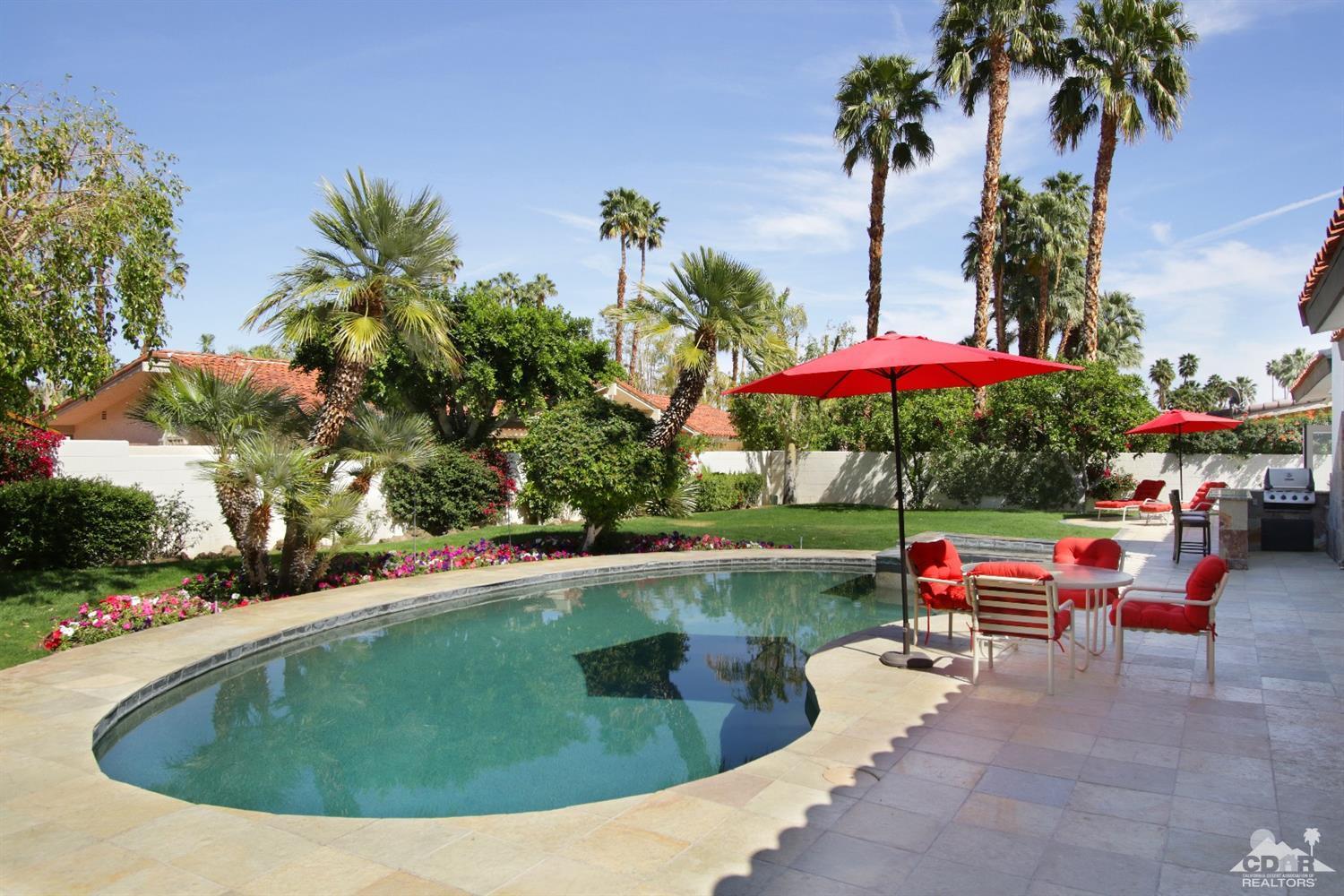75570 Fairway Drive Indian Wells, CA 92210 - Photo 34 of 38 a view of a swimming pool with a patio