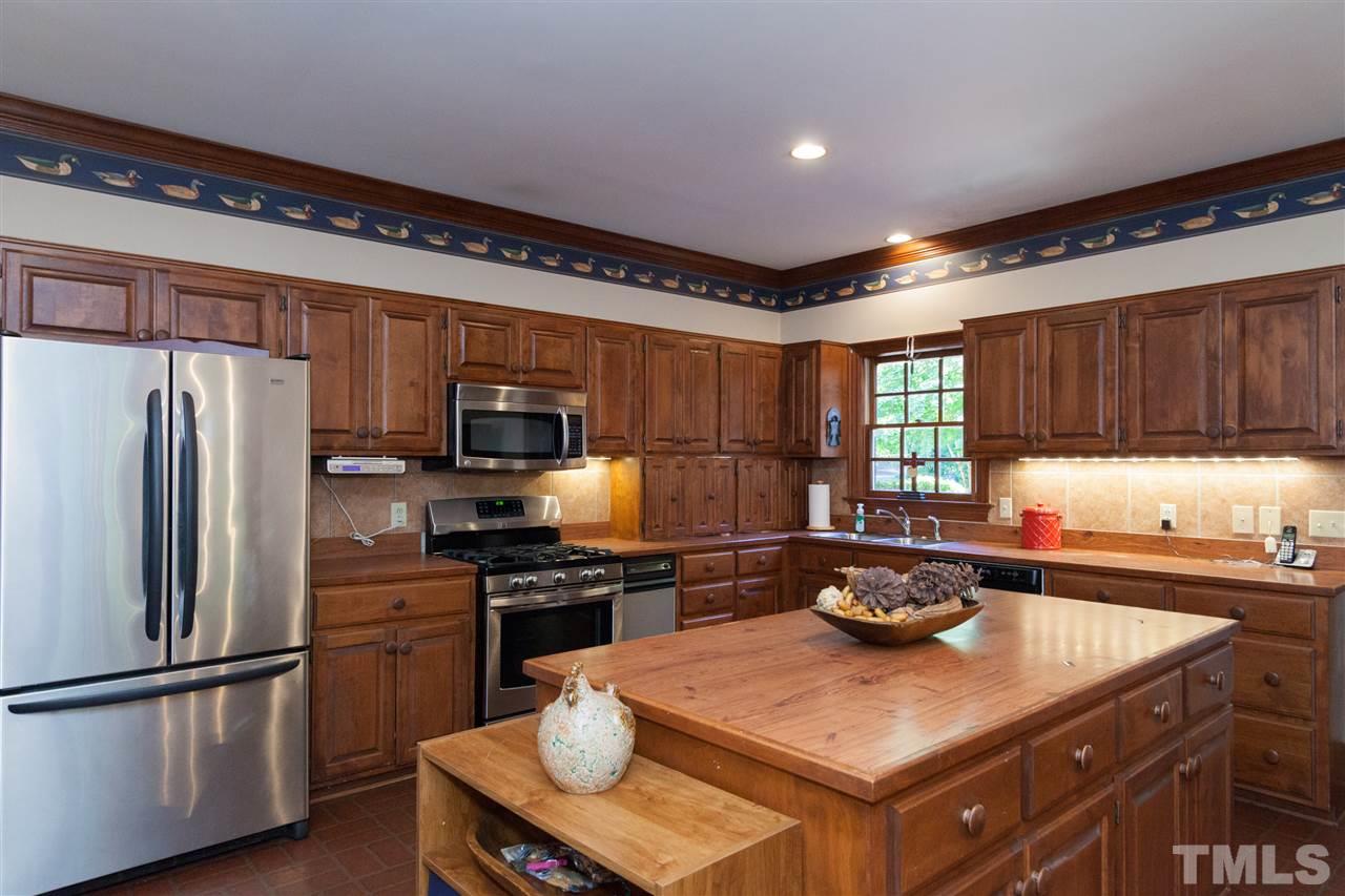 3372 Henley Road Sanford, NC 27330 - Photo 9 of 24 Kitchen with large center island and tons of cabinets!