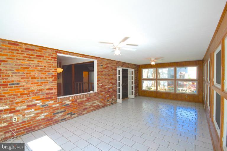 13007 Middlevale Lane Silver Spring, MD 20906 - Photo 6 of 30 a view of an empty room with a window