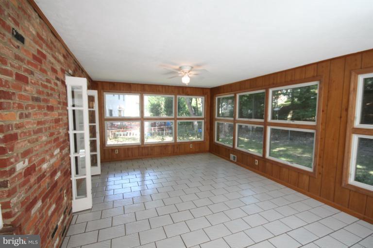 13007 Middlevale Lane Silver Spring, MD 20906 - Photo 7 of 30 a view of an empty room with a window