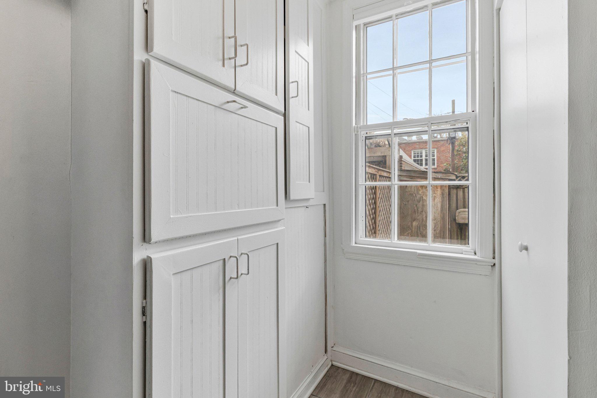 123 E Street Southeast Washington, DC 20003 - Photo 18 of 42 an empty room with windows