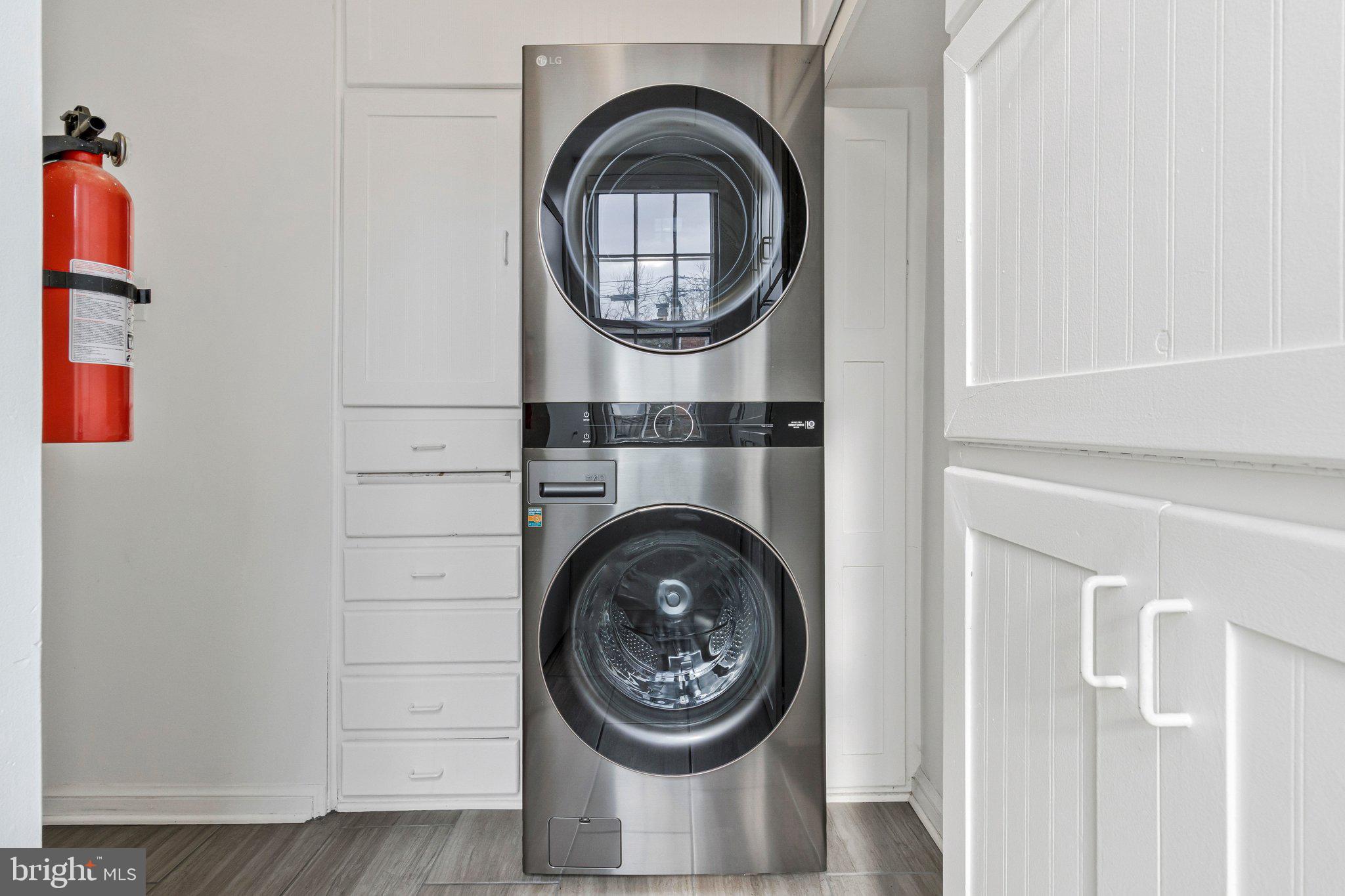 123 E Street Southeast Washington, DC 20003 - Photo 19 of 42 a close view of a utility room with dryer and washer
