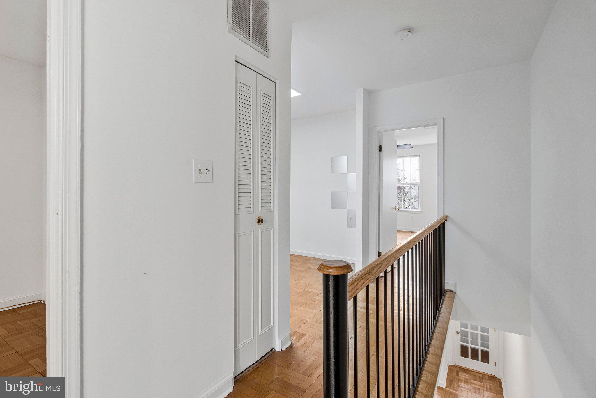 123 E Street Southeast Washington, DC 20003 - Photo 20 of 42 a view of a hallway with wooden floor and entryway