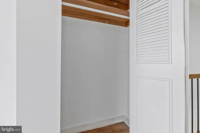 a front view of a house with a brick wall