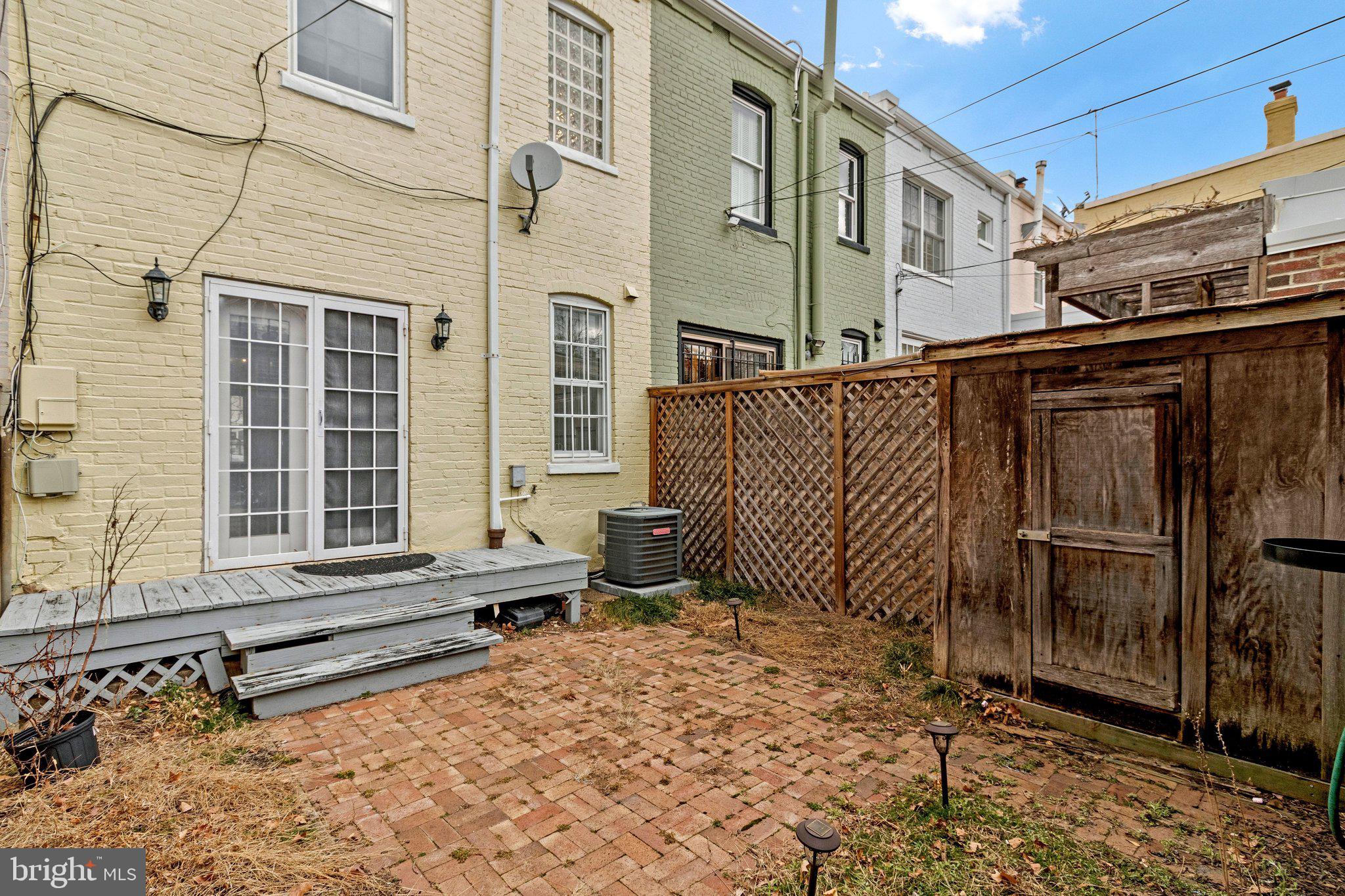 123 E Street Southeast Washington, DC 20003 - Photo 37 of 42 a view of a brick house with many windows