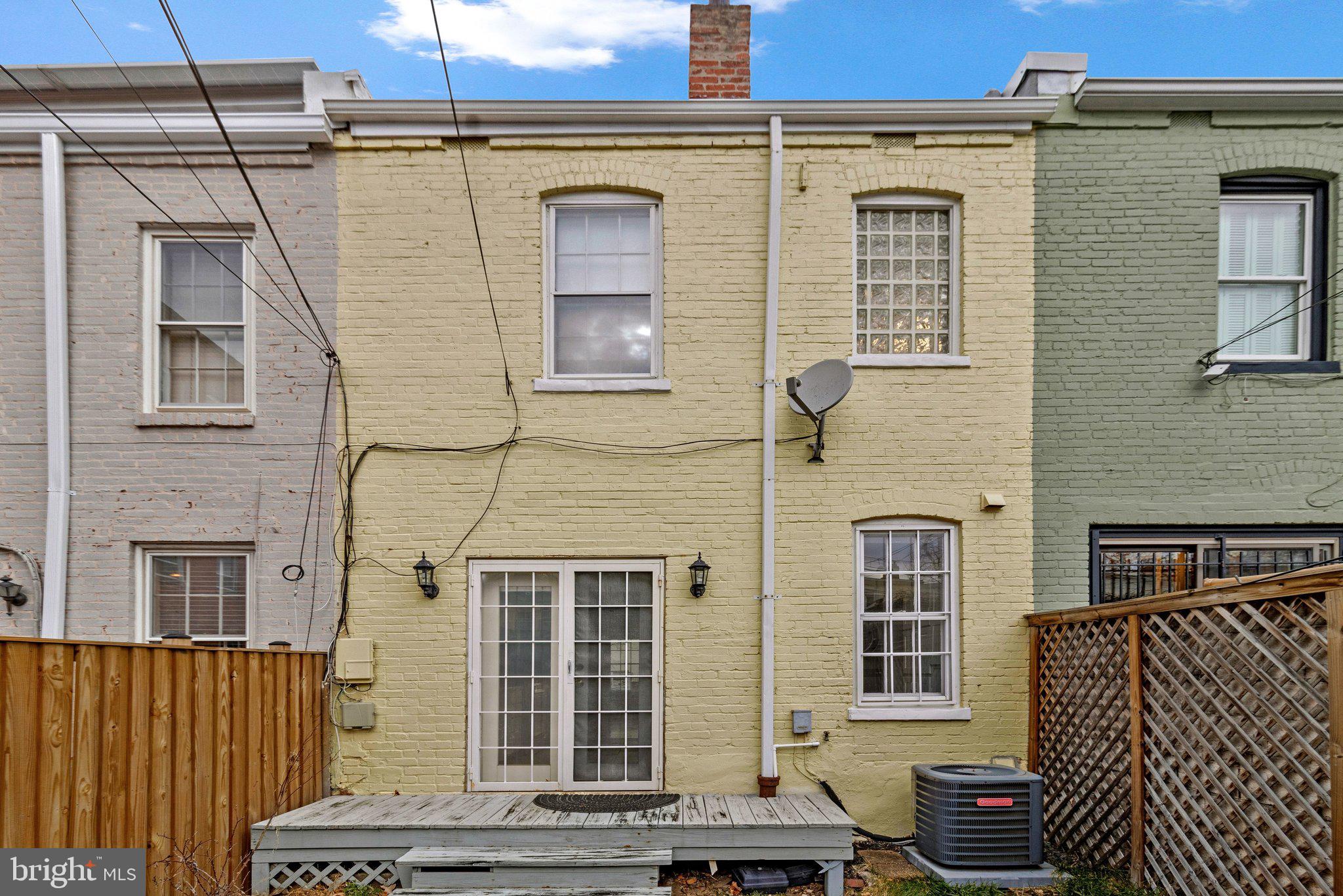 123 E Street Southeast Washington, DC 20003 - Photo 38 of 42 a front view of a house with a brick wall