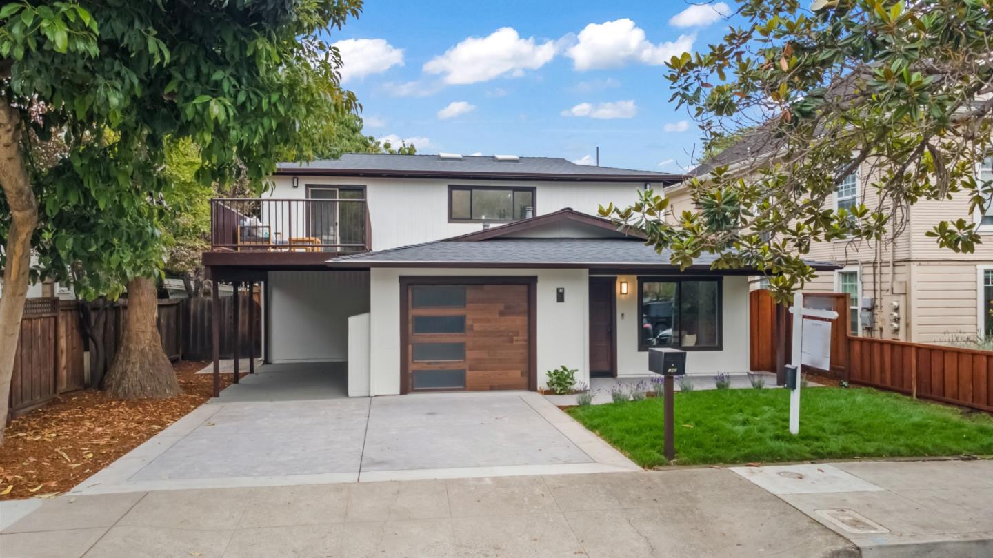 148 Myrtle Street Santa Cruz, CA 95060 - Photo 1 of 45 a front view of a house with a garden and plants