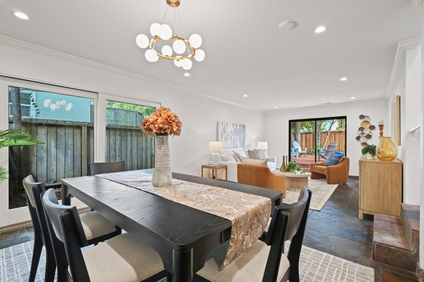 148 Myrtle Street Santa Cruz, CA 95060 - Photo 11 of 45 a view of a dining room with furniture wooden floor and chandelier