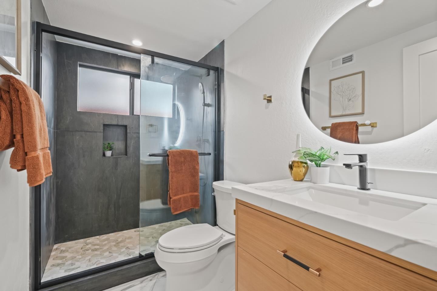 148 Myrtle Street Santa Cruz, CA 95060 - Photo 18 of 45 a bathroom with a sink a toilet and shower