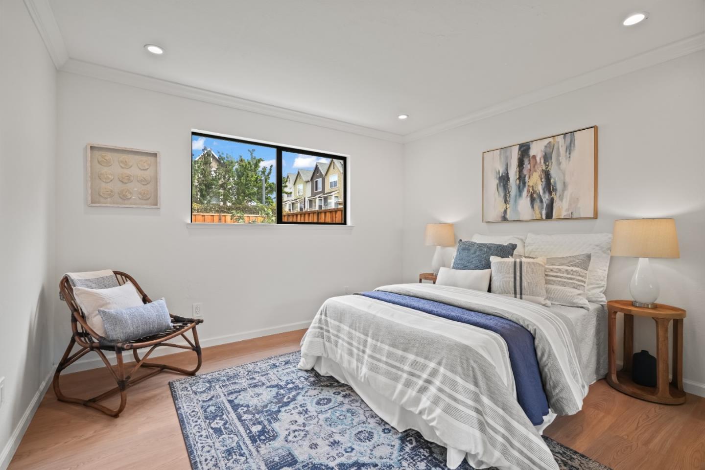 148 Myrtle Street Santa Cruz, CA 95060 - Photo 20 of 45 a bedroom with a bed and a window