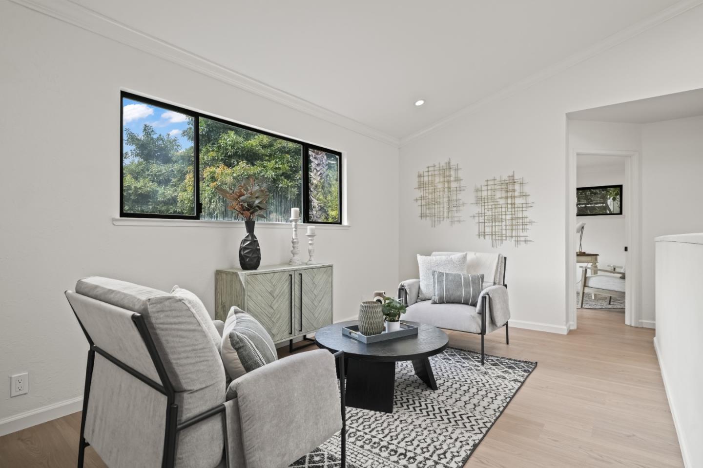 148 Myrtle Street Santa Cruz, CA 95060 - Photo 22 of 45 a living room with furniture a rug and a large window