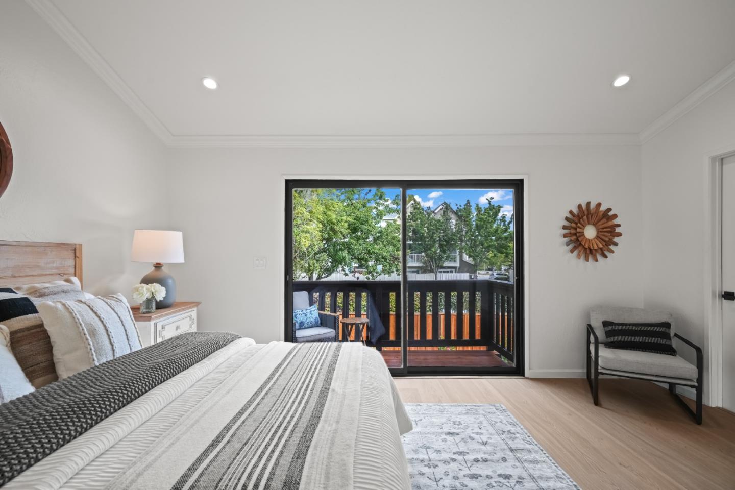 148 Myrtle Street Santa Cruz, CA 95060 - Photo 24 of 45 a bedroom with a large bed and a window