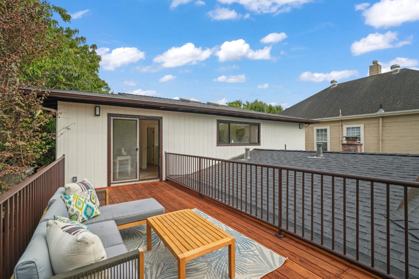 148 Myrtle Street Santa Cruz, CA 95060 - Photo 33 of 45 a backyard of a house with table and chairs