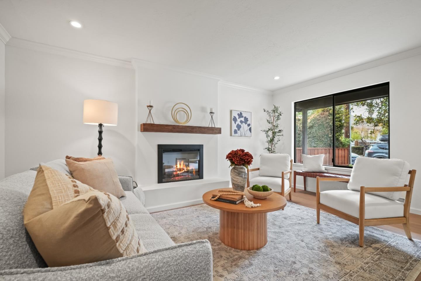 148 Myrtle Street Santa Cruz, CA 95060 - Photo 6 of 45 a living room with furniture a fireplace and a large window