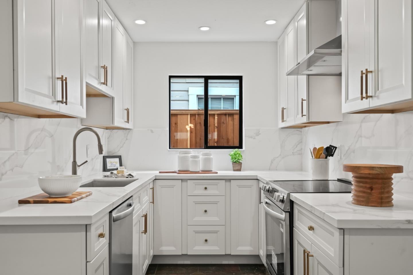 148 Myrtle Street Santa Cruz, CA 95060 - Photo 7 of 45 a kitchen with cabinets a sink and appliances