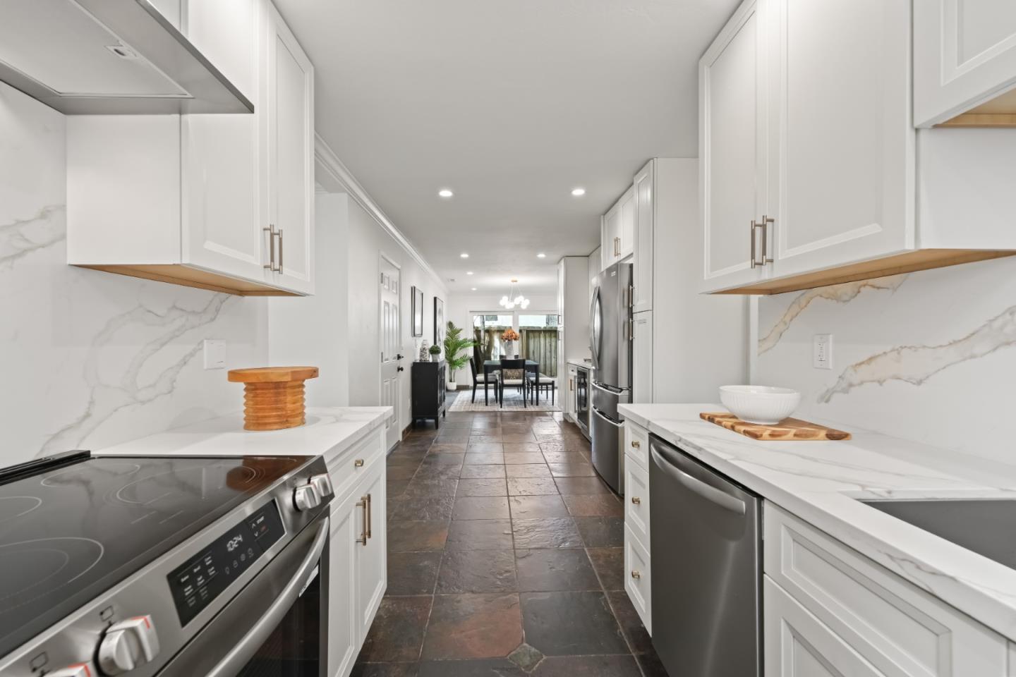 148 Myrtle Street Santa Cruz, CA 95060 - Photo 8 of 45 a kitchen with a sink and a stove top oven
